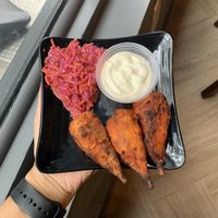 Hot wings w aioli ! pretty good but the wings are NOT spicy or saucy at all (would recommend getting hot sauce on the side for them)  at Copper Branch in New York City