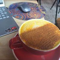 Tumeric latte - how did they know I like a lot of cinnamon 🤔 at Parlé Pantry in West London