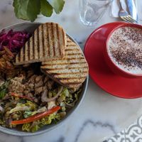 Salad plate and oatmilk cappuccino at Parlé Pantry in West London