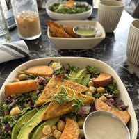 Seasonal Chickpea Buddha Bowl with a side of potato wedges   at New General in Winter Park
