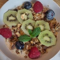 Warm Granola with fruits at Piekarnia Aromat in Warsaw