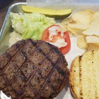 Impossible Burger with a side of chips at Toss'd in Hermitage