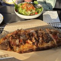 Vegan flatbread and side salad   at Labyrinth Press Company in Jamestown
