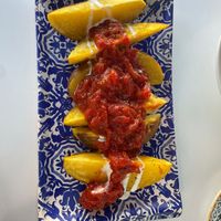 Bravas (available as vegetarian with spur cream, and vegan without) at Bar Canijo in Algodonales