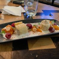 Earl Grey cheesecake w/ macadamia cream, raspberry and roast peach at Ballard's in Thornbury