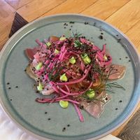 Cured target beetroot w/ red cabbage juice pickled kohlrabi, puffed quinoa, zucchini mayo and caramelized orange dressing at Ballard's in Thornbury