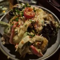 Crispy smoked+smashed potatoes w/chilli, lemon thyme vinaigrette $14: prefer less sauce so potatoes stay crispy at Ballard's in Thornbury