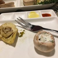 Veggies and array of sauces  at The Melting Pot in Farmingdale