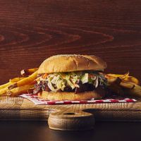BBQ Pulled Pork Sandwich

Made with our BBQ sauce, whole textured soybean, and our house coleslaw.  Significantly better than jackfruit. at Galaxy Rune in Seattle