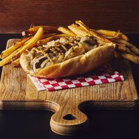 Bratwurst

Our large house crafted bratwurst is full of flavor.  It comes covered in grilled sauerkraut/onions, and topped with stone ground mustard at Galaxy Rune in Seattle