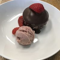 Chocolate cake with strawberry mousse and strawberry ice cream.  at Foodhisattva in Cleveland Heights