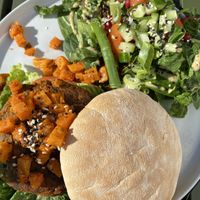 Zalige burger met een goed gevulde side salad  at Zebedeus in Wassenaar