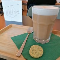 Latte with oatmilk. The cookie is not vegan! at LIEF in Mechelen