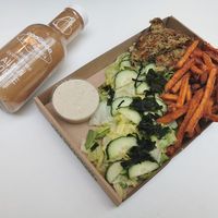 The Ocean burger plate and 100% apple-pear juice. at Las Vegan's - Corvin Plaza in Budapest