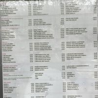 The menu in the window   at Radha Krishna Bhavan in South West London