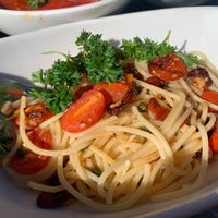 Spaghetti Puttanesca comes in olive oil, capers, roasted tomato, olives. It was delicious. at Loveria Caffè in Colleyville