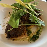 Zucchini, mint and dukkah fritters, pumpkin and tahini whip, grilled halloumi & green sauce $23 (it can be vegan). It was super yummy  at My Little Kitchen in Healesville