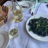 Greens with olives and white wine at To Kati Allo in Athens