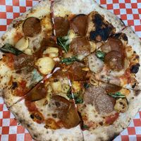 Vegan Pepperoni Pizza with Roasted Garlic and Herbs  at The Pizza Collective in Reno