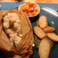 Baked cauliflower, potatoes with pesto sauce and tomato salad at aufatmen in Leutasch