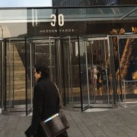 One of the street entrances to the building of 30 Hudson Yards..  at Van Leeuwen Ice Cream - Hudson Yards in New York City