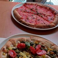 Pizza Marinara (above) and Pizza Ortolana (partially below) at Berberè - Navigli in Milan