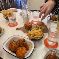 Middle: facon patty, impossible burger. In front of those: rosemary chips. Very front: cauliflower wings   at Tilt in Plymouth