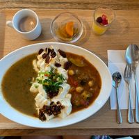 Bean curry (left), and seasonal cold vegetable curry (right) with tofu. Don’t know if the soup is vegan.  at Nanahoshi Curry in Kanazawa