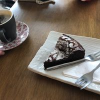 Cake and coffee   at Meli Cafe in Newcastle Upon Tyne