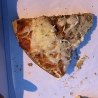 Slice of (vegan) cheese pizza at Minnies Pizza in Exmouth