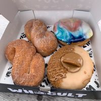 cinnamon twist, cosmic glaze and biscoff donuts (all vegan🌱)  at WHO CULT in Bridgend