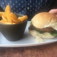 Vegan burger with chips at Stag Coffee in Canterbury
