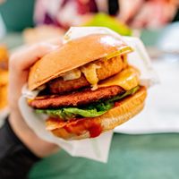 Hightop: Henry's Paddie, lettuce, tomato, pickles, vhedder, onion rings, with smokey BBQ and Ranch Sauce  at Henry's Burgers in Fitzroy