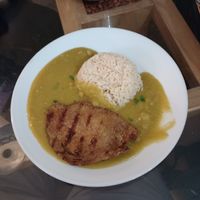 "Pure de arbeja verde con gluten a la parilla."
Gluten steak with pea puree. 
 at El Olivo in Cusco