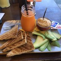 Toast with avocado and hummus  at Senso Unico in Olbia