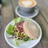 Avocado toast with olives and onions - yum!  at Cavegirl Coffeehouse in Longmont