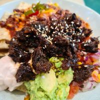 Cheesy nachos with cheeeeekin at Home Vegan Bar in Docklands