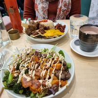 Taco bowl and green salad + cacao latte and juice at Home Vegan Bar in Docklands
