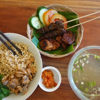 Ayam Bakar (Roasted Chicken) and Sate Kambing (Mutton Satay) served with noodles, broth and chili. at Go Vegan Bali in Tibubeneng