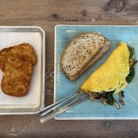 Veggie Lovers Omelette with a side of hash browns  at Turf Surf & Earth in Somerville