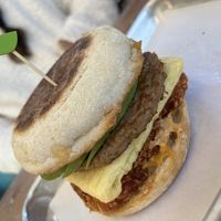 Breakfast Sandwich on an English muffin with added hash brown and avocado   at Turf Surf & Earth in Somerville