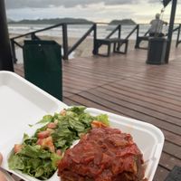 Veggie lasagna and green salad at Pico Feliz in Samara