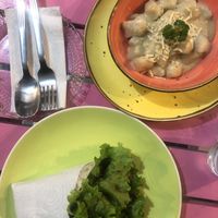 Gnocchi with the cream sauce and gallo pinto wrap. The wrap was amazing, gnocchi was bland maybe try the pesto sauce instead of the cream sauce. at Pico Feliz in Samara