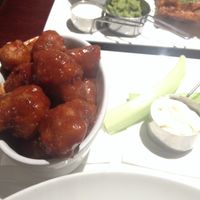 Cauliflower bites. Not bad, but too much spicy sauce overpowers the flavour & texture. at Abbey Tavern in Howth