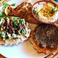 Three Manooshet with hummus at Izz Cafe in Cork