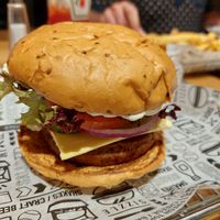 Spicy jalapeño burger and french fries at the back at Smashburger in Brighton