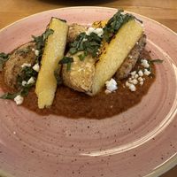 Seasonal Polenta Dish  at Tasty Harmony in Fort Collins