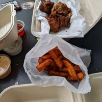 Sweet potato fries and cauliflower wings (Sriracha aioli and ranch, both vegan, on the left at Grandeur in Oakland