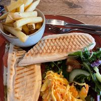 Pesto and mozzarella panini with fries and coleslaw (vegan!)  at The Donkey Sanctuary in Sidmouth