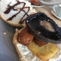 Breakfast bap with vegan sausage, field mushroom and hashbrowns  at The Donkey Sanctuary in Sidmouth